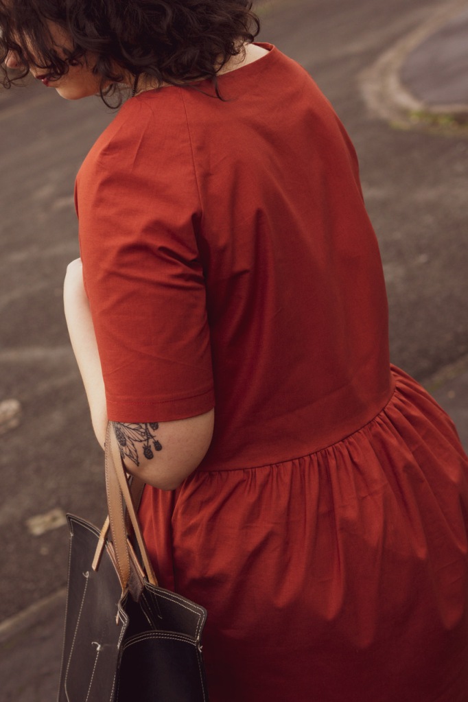 Portrait photo of the back of The Gathered Dress. 